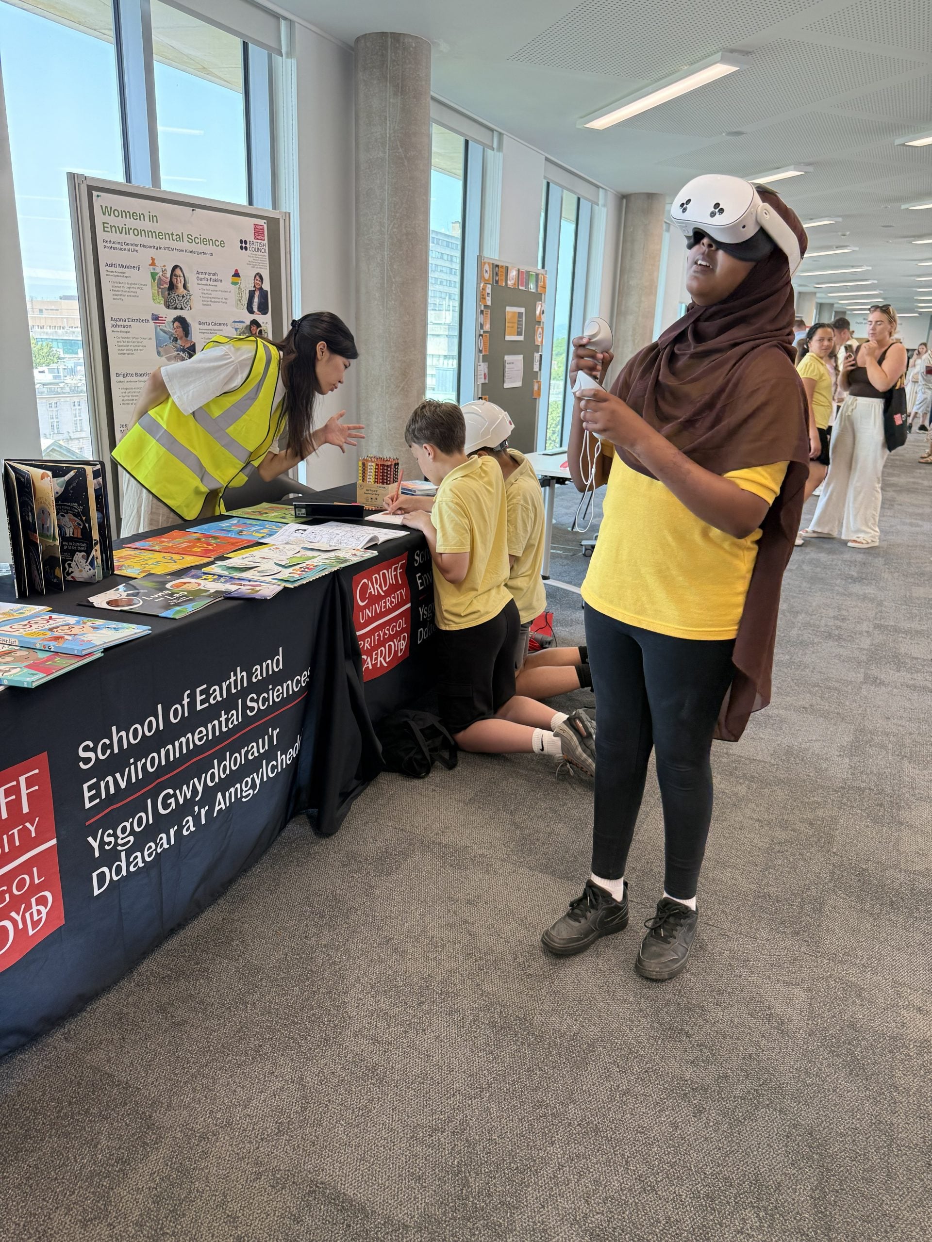 Figure 5. Girl viewing a volcanic eruption through VR glasses. Photo: Dr (Phd) Diana contreras.